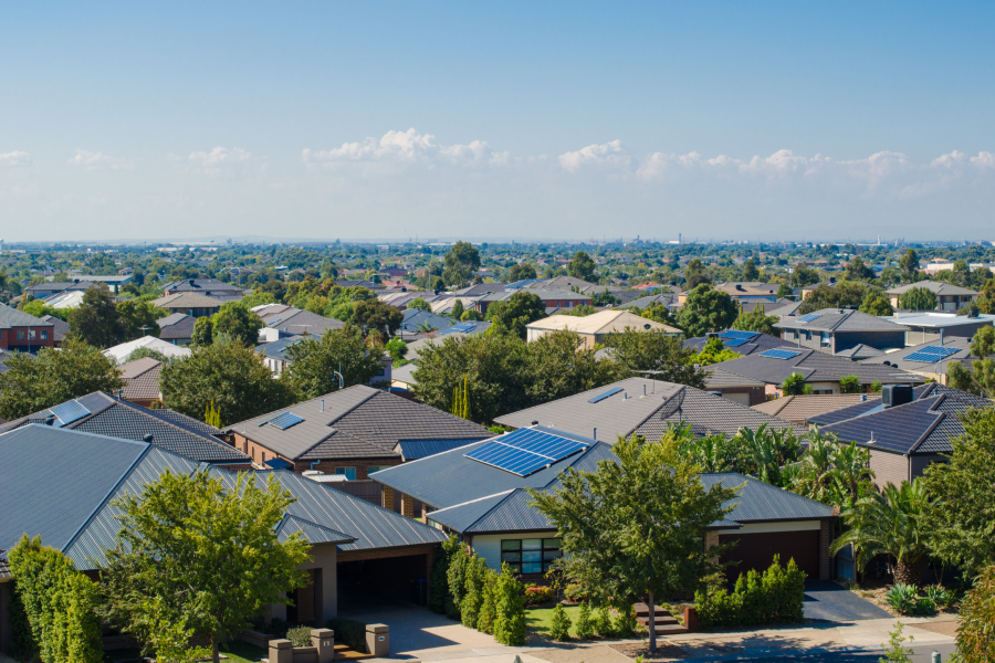 Ariel view of house rooftops.
